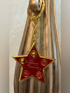 ⭐️ Madame Tussauds Gold & Red Star Keychain / Charm ⭐️